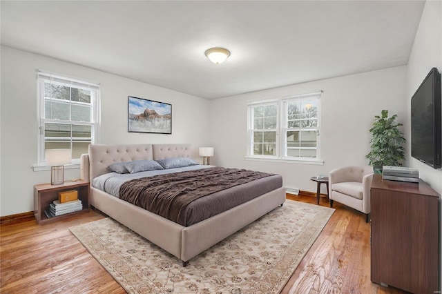 bedroom featuring light wood-type flooring