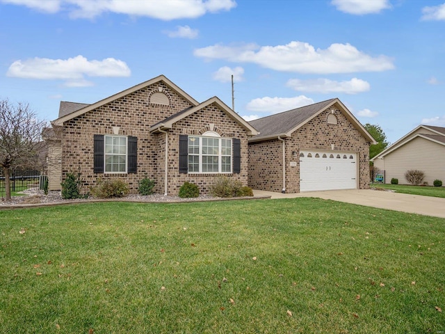 view of front of home with a garage and a front lawn