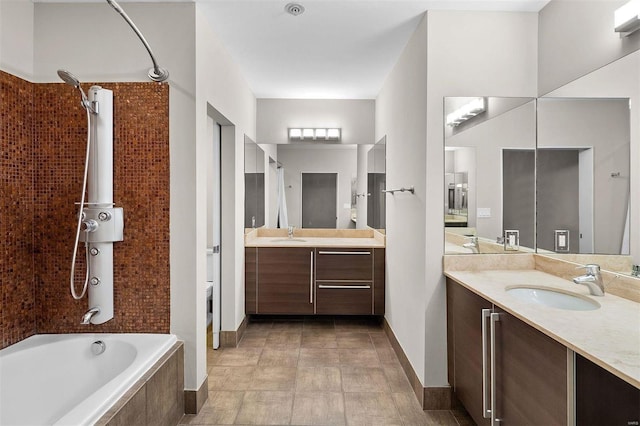 bathroom with two vanities and a sink