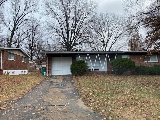 ranch-style home with a garage