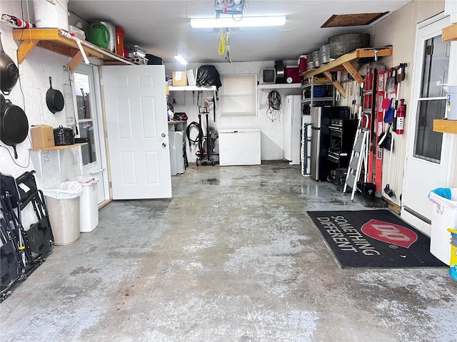 garage featuring refrigerator