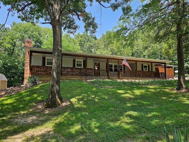 ranch-style home with a front yard