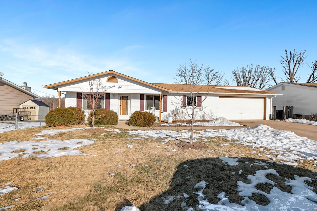 view of front of home with a garage and covered porch