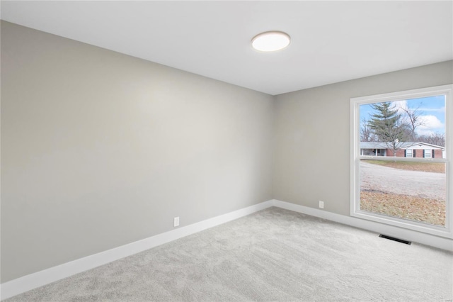 view of carpeted spare room