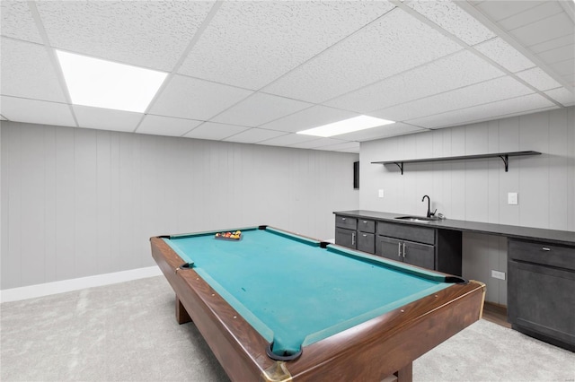 game room with a paneled ceiling, light carpet, indoor wet bar, and pool table