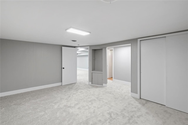 basement with light carpet