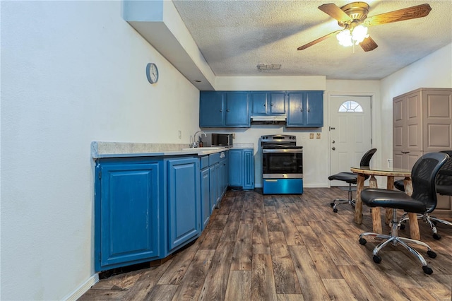 kitchen with dark hardwood / wood-style floors, sink, stainless steel range with electric cooktop, blue cabinetry, and a textured ceiling