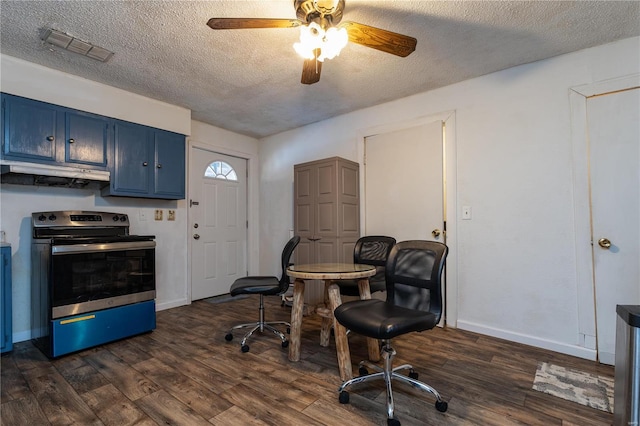 office area featuring ceiling fan, a textured ceiling, and dark hardwood / wood-style flooring