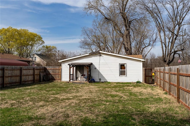 exterior space with a fenced backyard