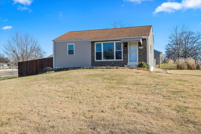 view of front of property with a front lawn