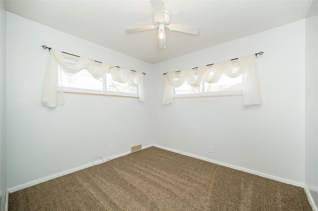 unfurnished room featuring carpet flooring and ceiling fan