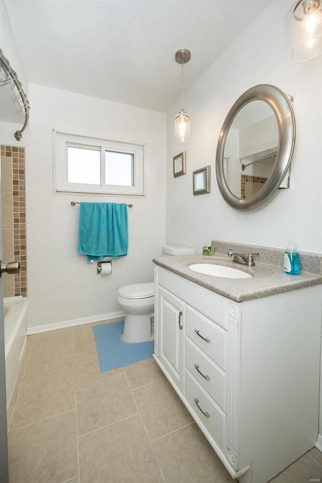 full bathroom with tile patterned floors, vanity, tub / shower combination, and toilet