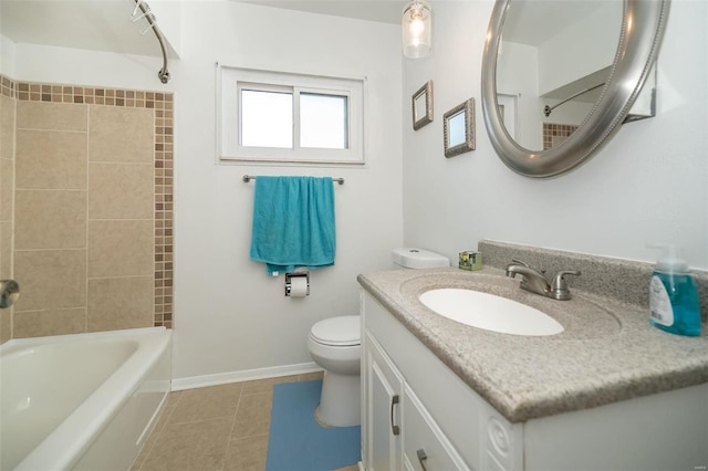 full bathroom featuring tile patterned floors, vanity, toilet, and tiled shower / bath