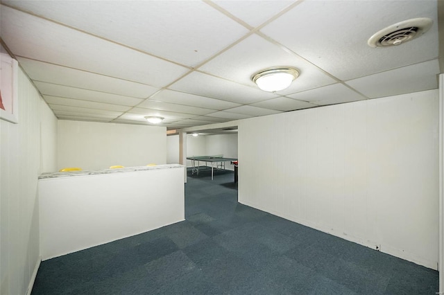 basement with a drop ceiling