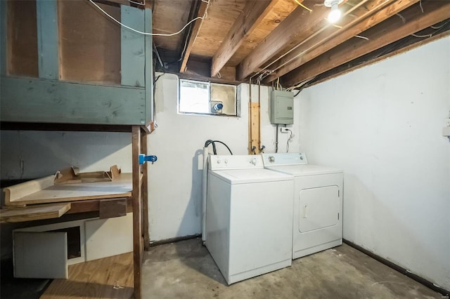 clothes washing area featuring washing machine and clothes dryer