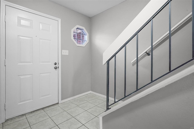 foyer with light tile patterned floors