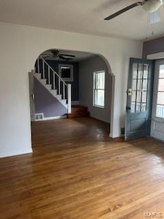 interior space featuring ceiling fan and wood-type flooring