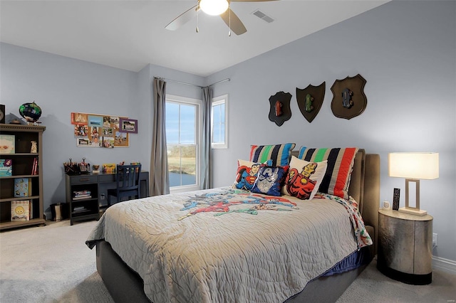 carpeted bedroom featuring ceiling fan