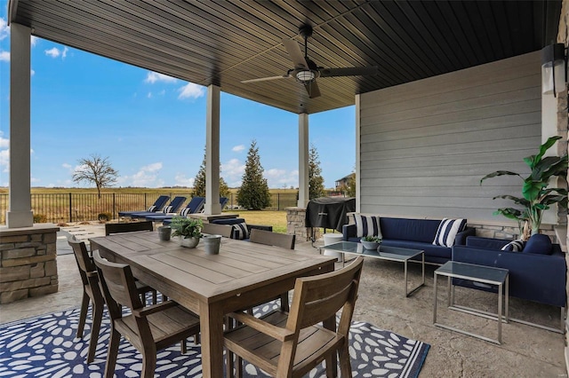 view of patio / terrace with ceiling fan and an outdoor hangout area