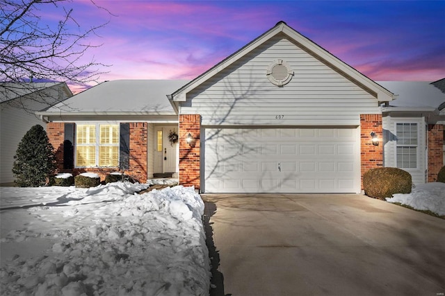 view of front of property with a garage