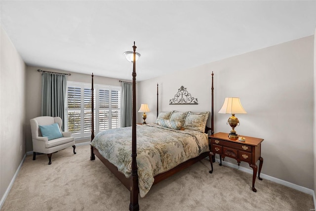 bedroom with light colored carpet