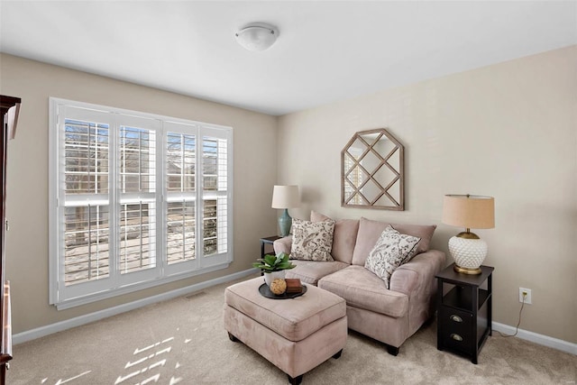 living room with light colored carpet