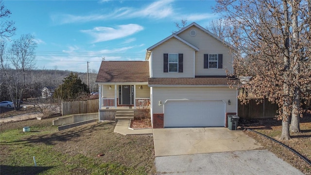 view of front facade featuring a garage and a front lawn