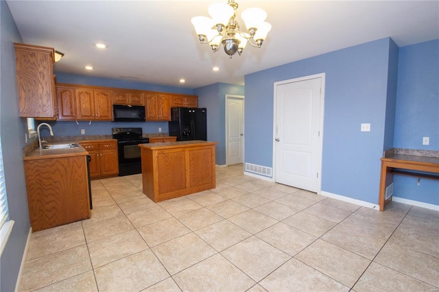 kitchen with light tile patterned floors, a center island, sink, and black appliances