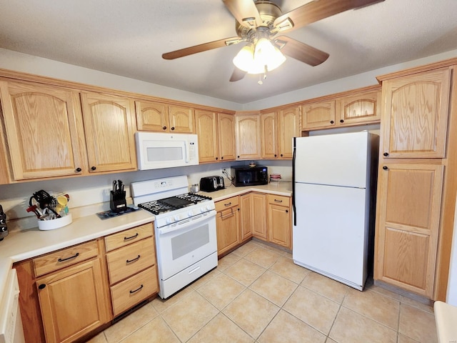 kitchen featuring ceiling fan, light brown cabinets, white appliances, and light tile patterned floors