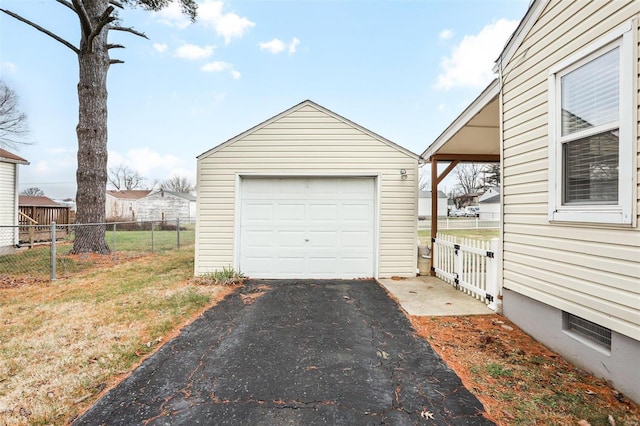 garage featuring a yard