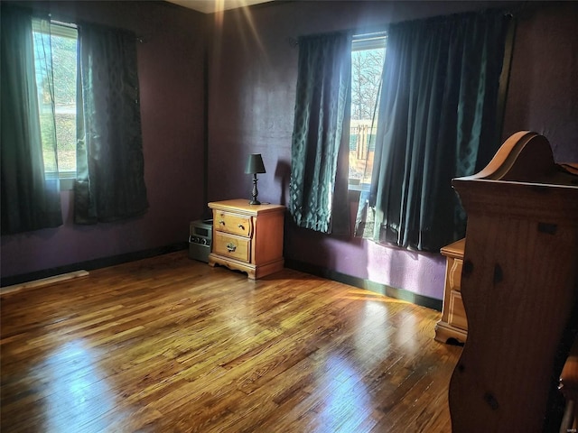 bedroom featuring hardwood / wood-style floors