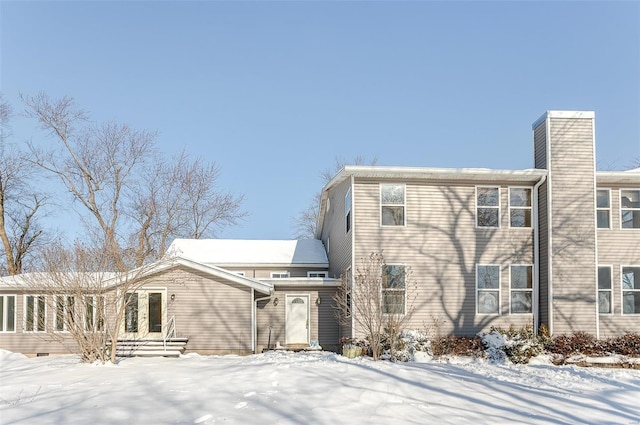 view of snow covered property