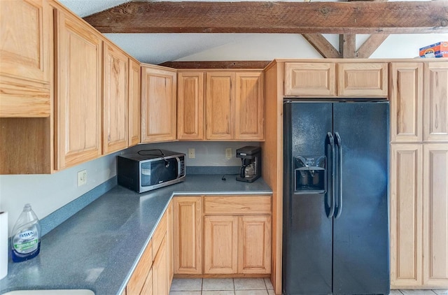 kitchen with black refrigerator with ice dispenser, light brown cabinetry, and light tile patterned floors