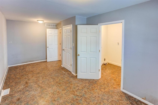 unfurnished bedroom featuring a closet