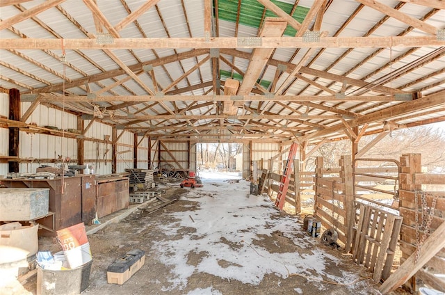 miscellaneous room featuring lofted ceiling