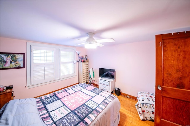 bedroom featuring ceiling fan and light wood-type flooring