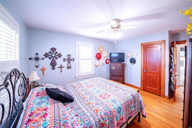 bedroom featuring ceiling fan and light wood-type flooring