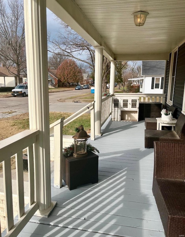 wooden terrace with covered porch