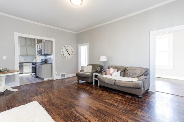 living room featuring crown molding and dark hardwood / wood-style floors