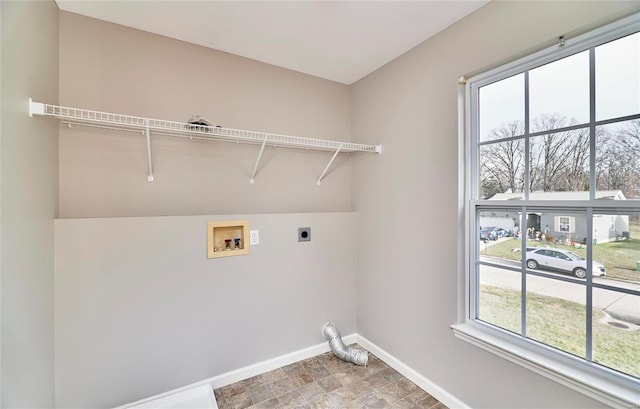 laundry room featuring washer hookup and electric dryer hookup