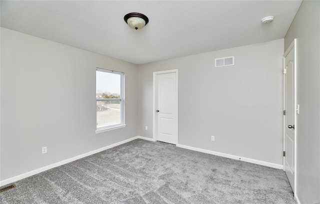 view of carpeted spare room