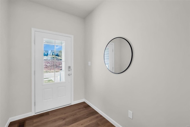 entryway with dark hardwood / wood-style floors