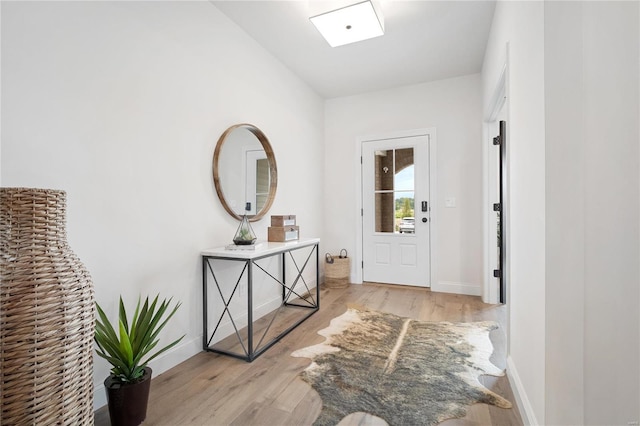 foyer with light hardwood / wood-style flooring