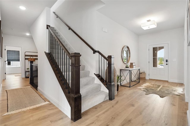 entrance foyer with light hardwood / wood-style floors