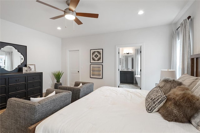 bedroom with ceiling fan and ensuite bathroom