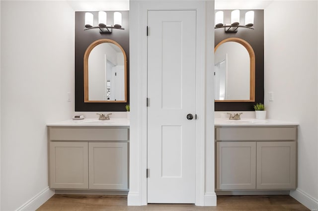 bathroom featuring vanity and hardwood / wood-style flooring