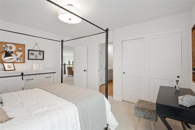 carpeted bedroom featuring a closet