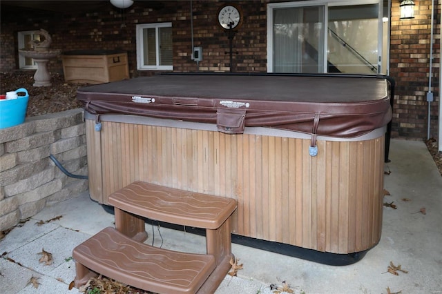 view of patio / terrace featuring a hot tub