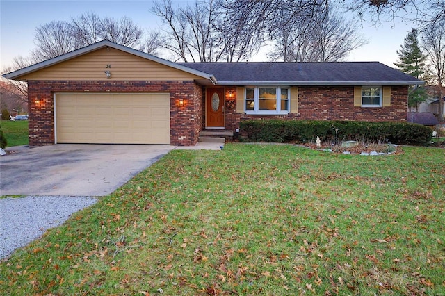 single story home featuring an attached garage, driveway, brick siding, and a front yard