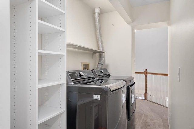 laundry area featuring carpet floors and washing machine and clothes dryer